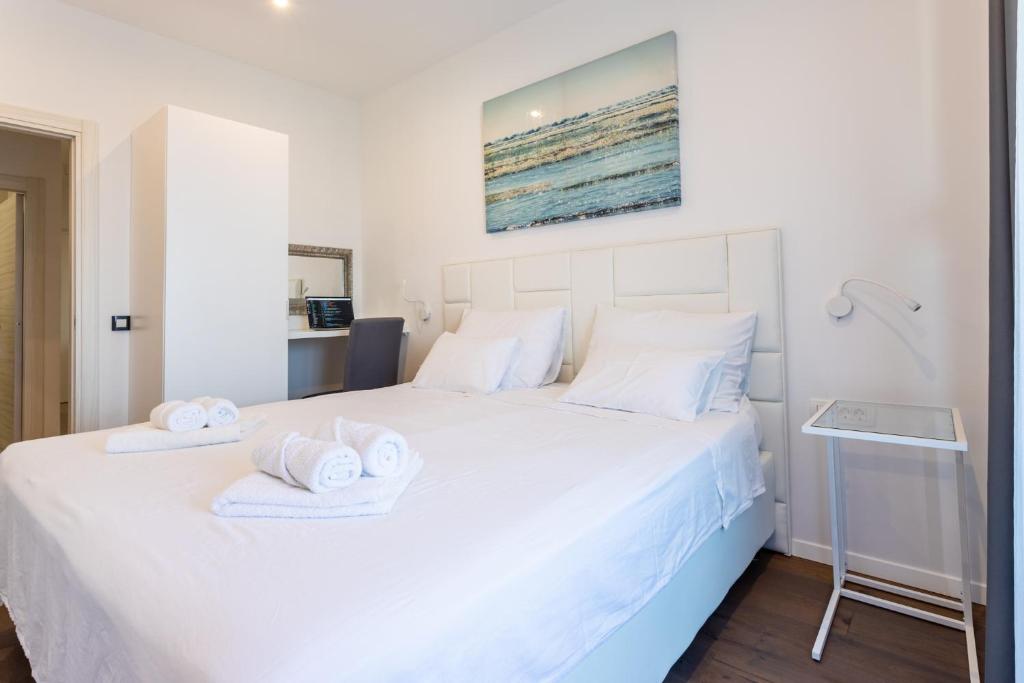 Posteľ alebo postele v izbe v ubytovaní Apartment Lola