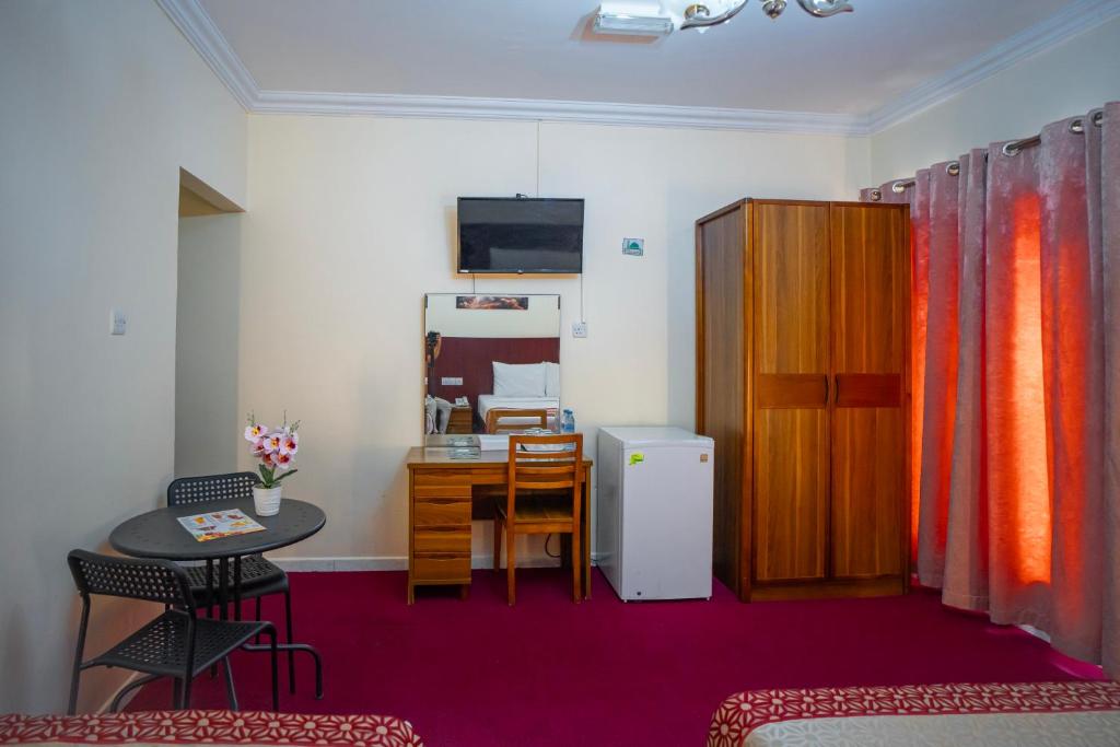 Kuchyň nebo kuchyňský kout v ubytování Al Karnak Hotel