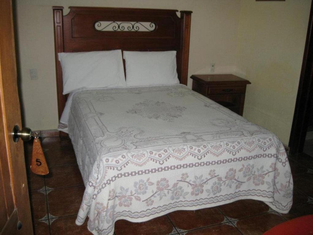 Postel nebo postele na pokoji v ubytování Hotel Posada Santa Fe