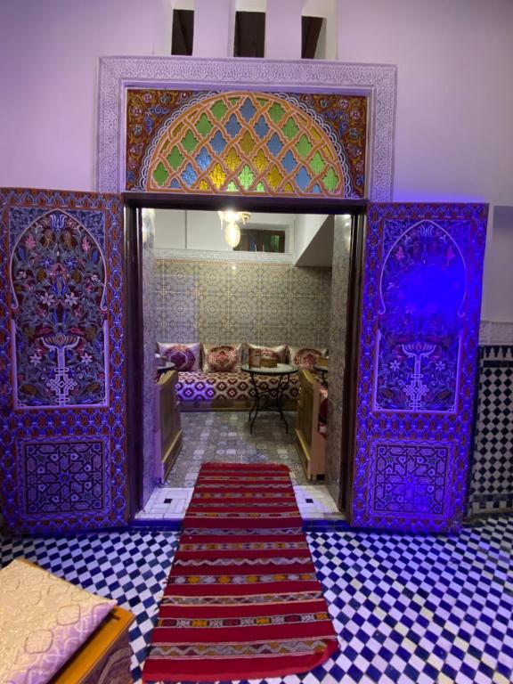 Postel nebo postele na pokoji v ubytování Riad Fes Lile