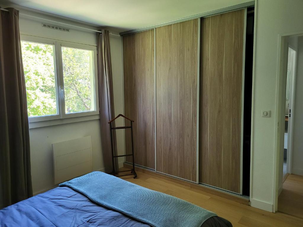 Ein Bett oder Betten in einem Zimmer der Unterkunft Appartement R&eacute;sidence Villeneuve