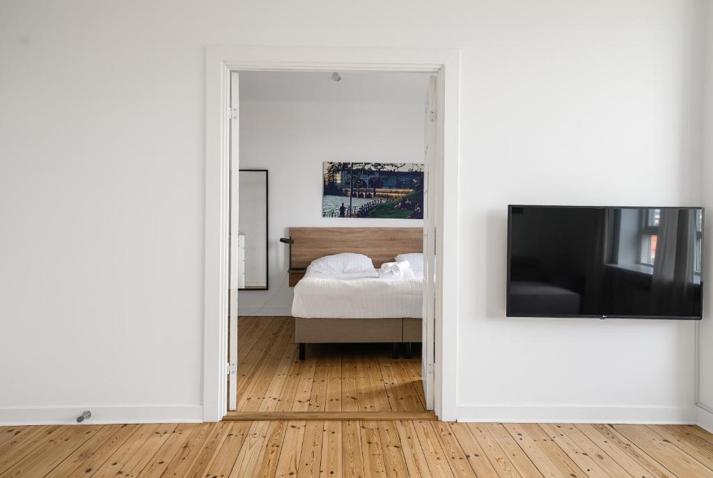 Krevet ili kreveti u jedinici u objektu Fantastic 2-bed w balcony in Charlottenlund
