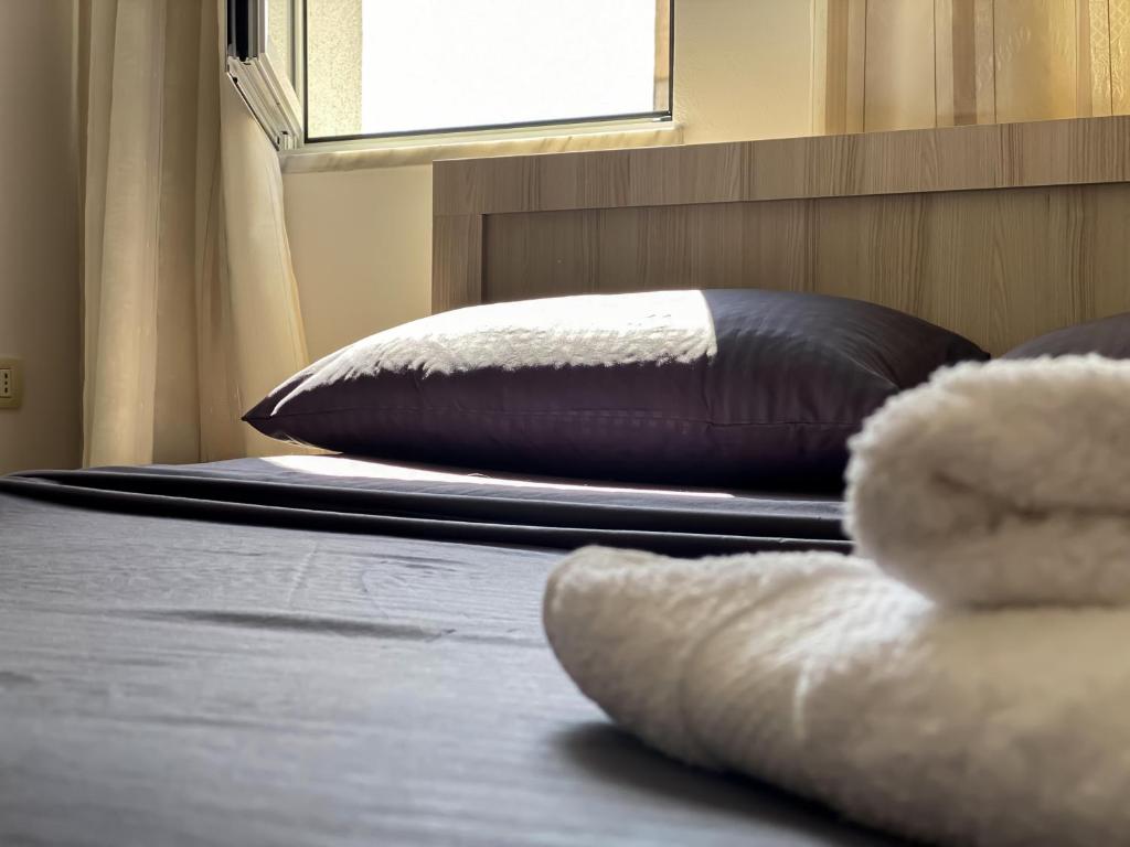 Postel nebo postele na pokoji v ubytování Northgate Apart-Villa