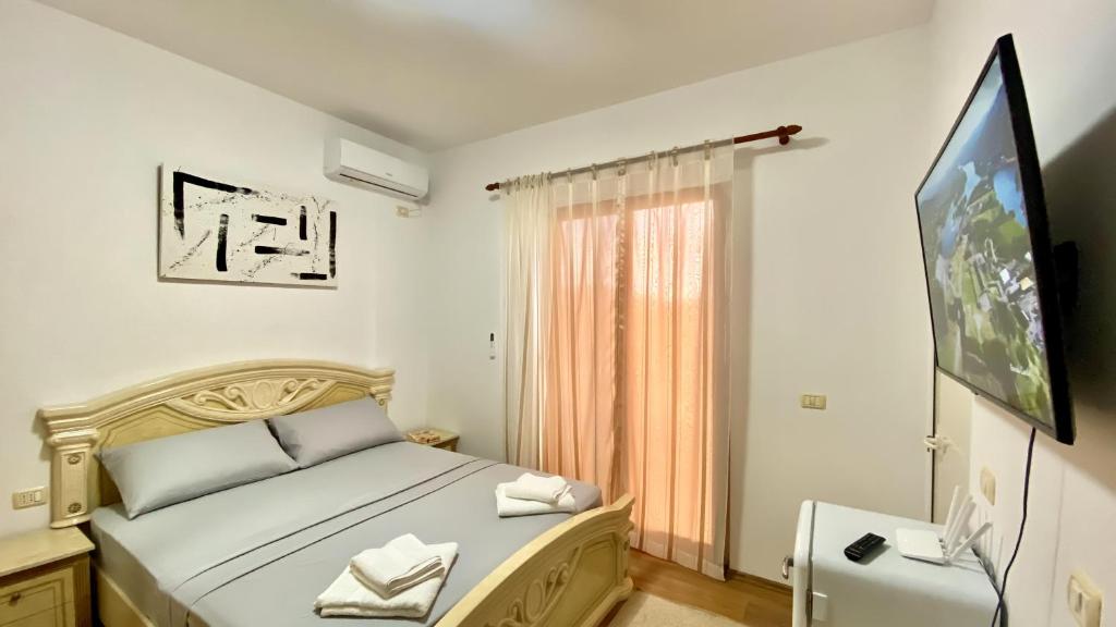 Postel nebo postele na pokoji v ubytování Northgate Apart-Villa