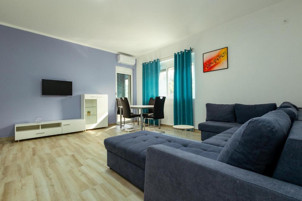 Posezení v ubytování DERON Apartments