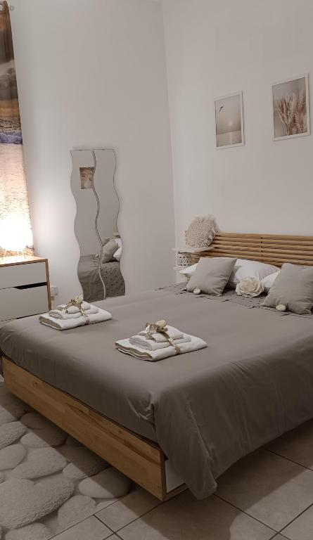 Letto o letti in una camera di Risvegli Partenopei House