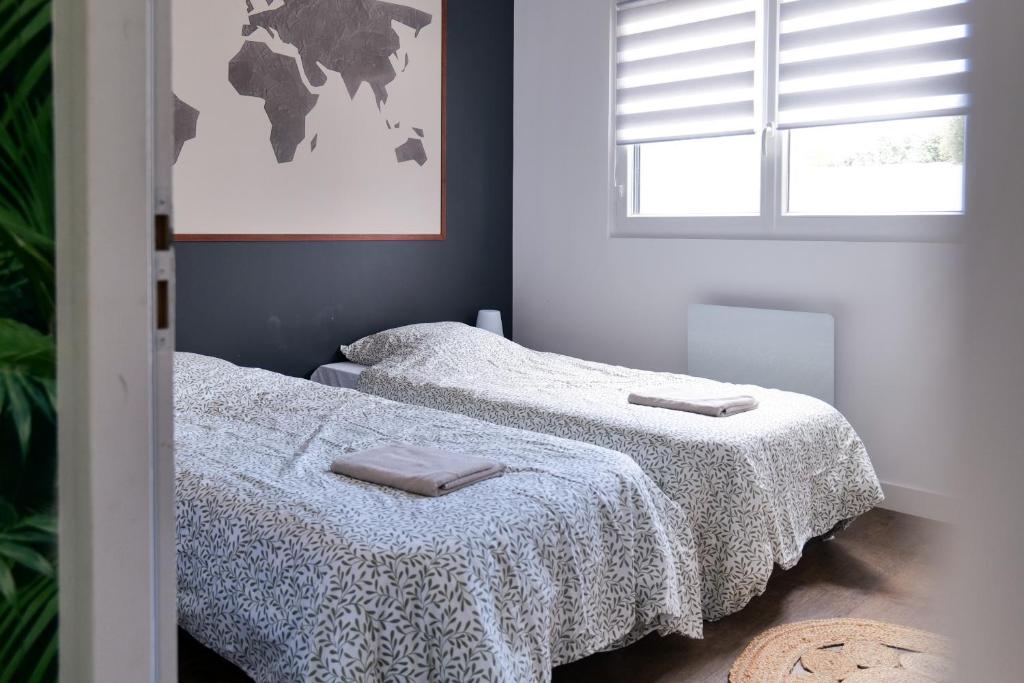 Posteľ alebo postele v izbe v ubytovaní Superbe maison de vacances entre plage et marais - 7 pers
