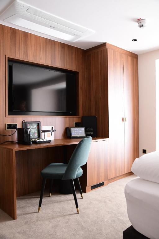 Kuchyň nebo kuchyňský kout v ubytování Hotel Am Schloss Aurich
