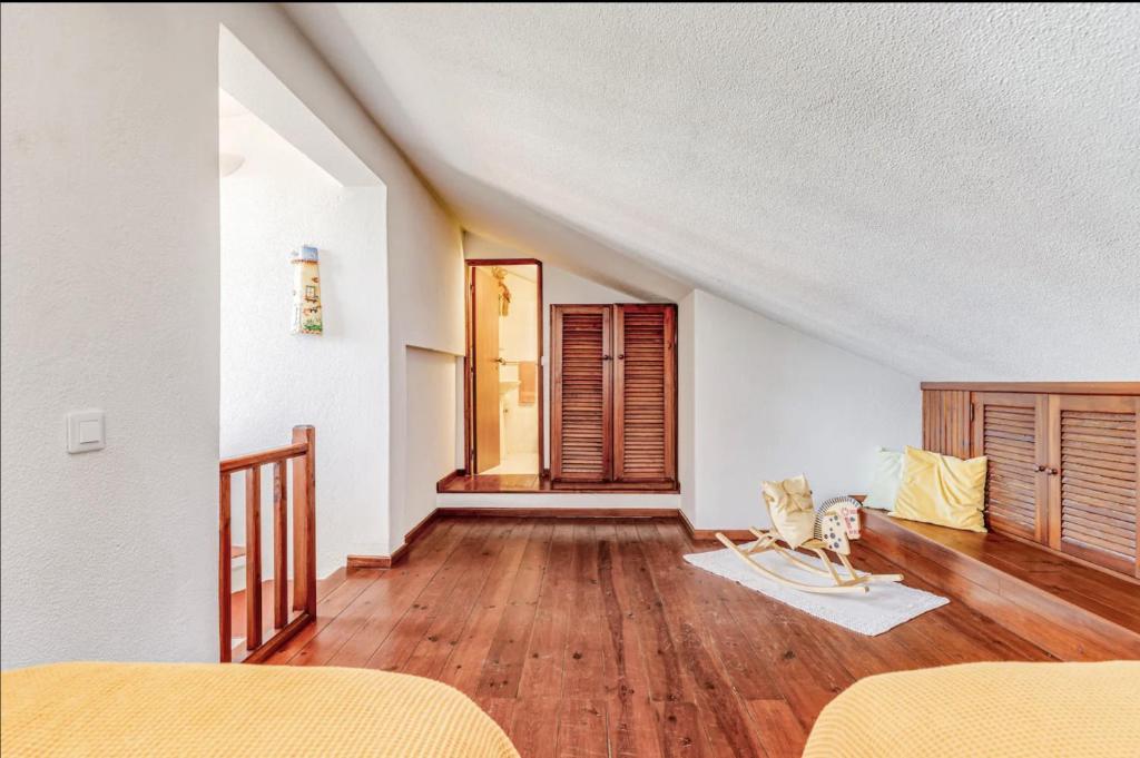 Postel nebo postele na pokoji v ubytování Casa da Falésia