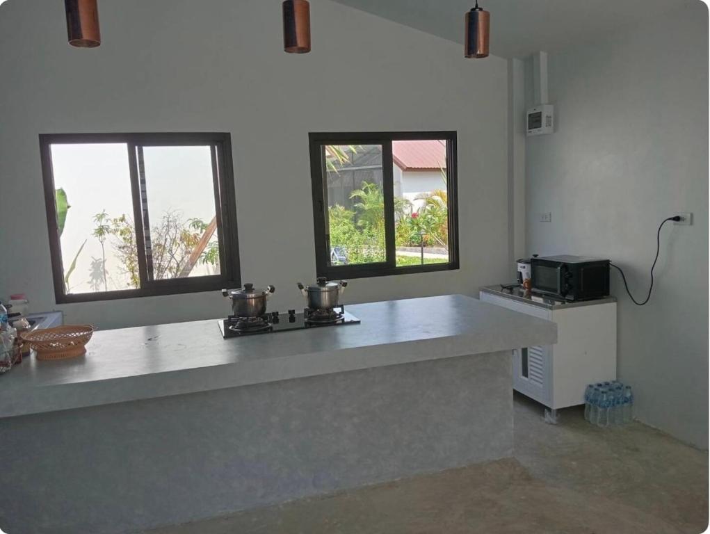 Kuchyň nebo kuchyňský kout v ubytování Rapina House