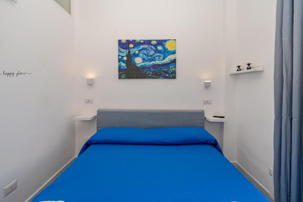 Кровать или кровати в номере Casa L'Aurora