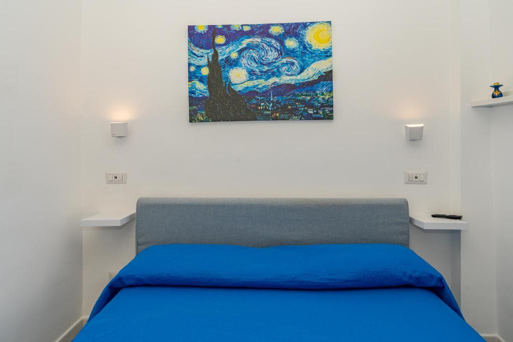 Кровать или кровати в номере Casa L'Aurora