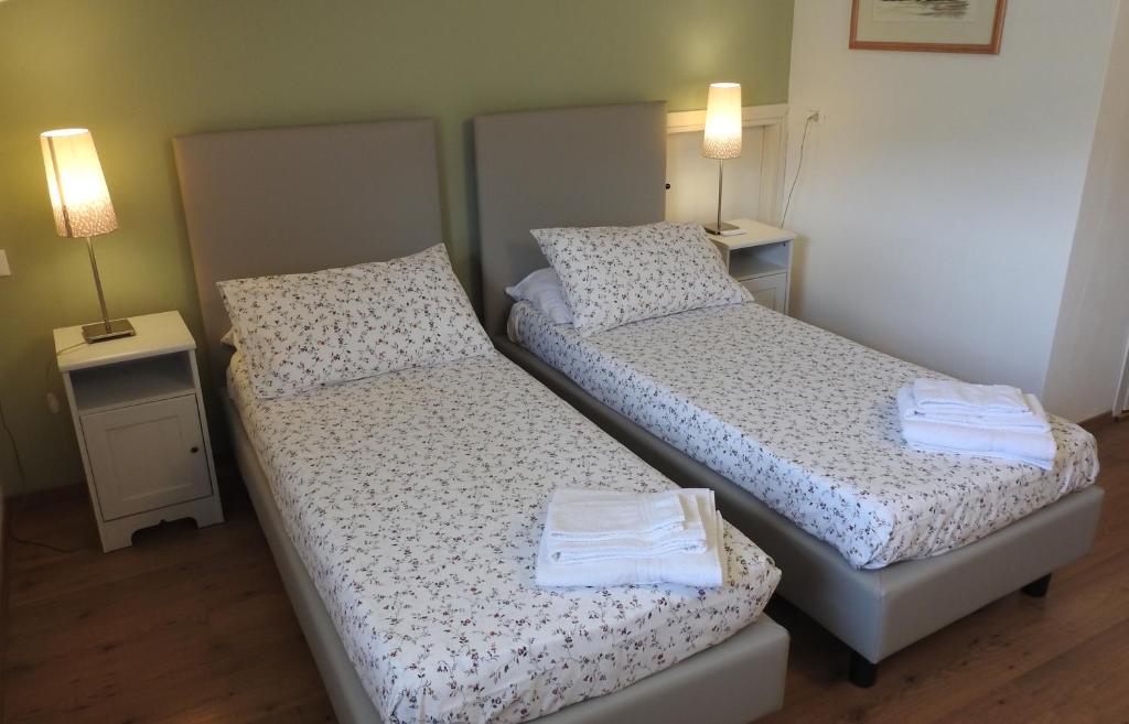 Postel nebo postele na pokoji v ubytování La casa di Clara