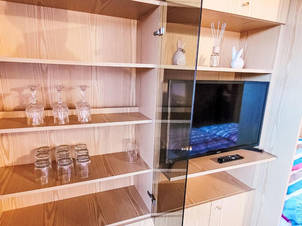 TV a/nebo společenská místnost v ubytování Apartment Top A45 by Interhome