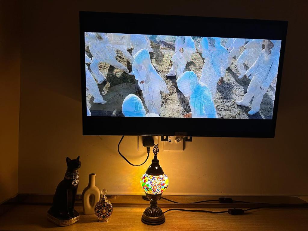 TV a/nebo společenská místnost v ubytování Royal Paris Guest House 皇家巴黎賓館