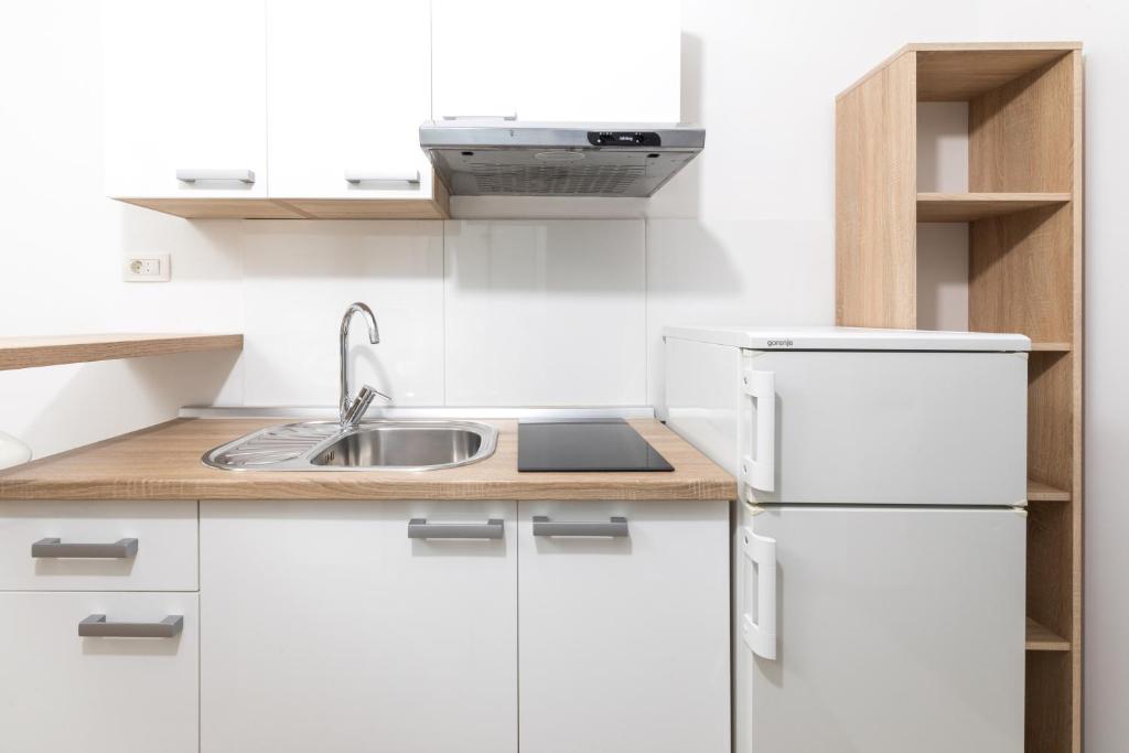 Kuchyň nebo kuchyňský kout v ubytování Stella Mare Eco Boutique House