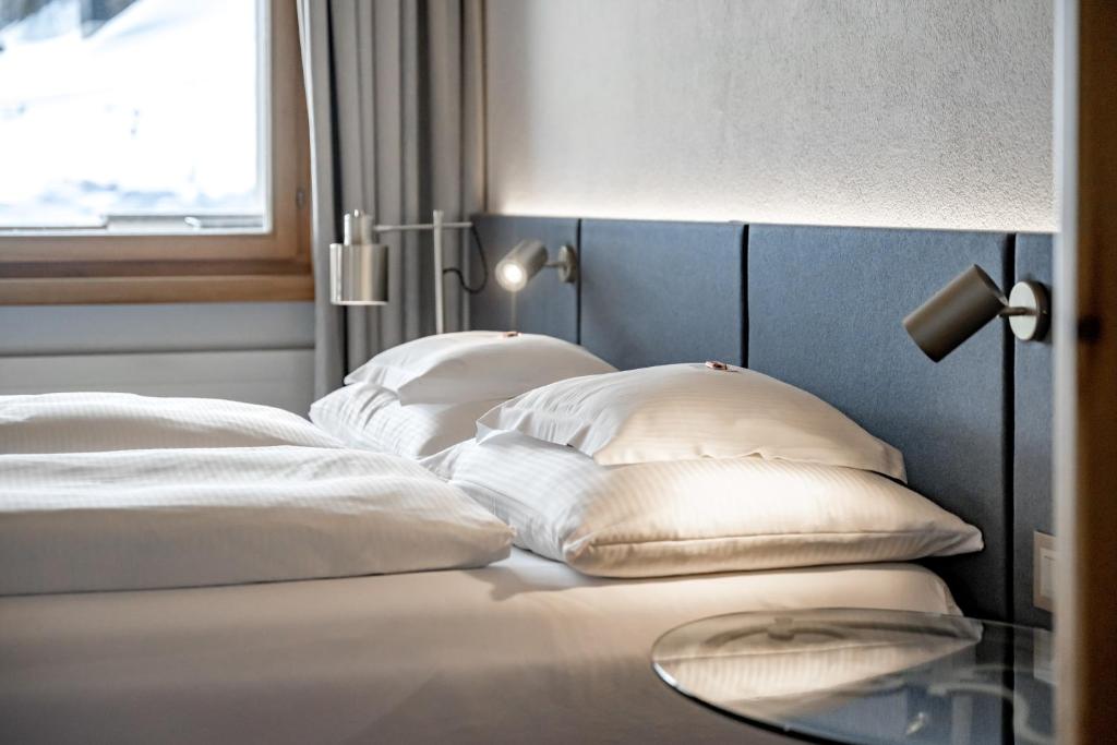 Postel nebo postele na pokoji v ubytování Hotel Nevada