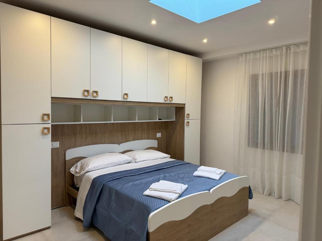 Postel nebo postele na pokoji v ubytování B&B La Coccinella