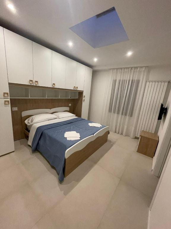 Postel nebo postele na pokoji v ubytování B&B La Coccinella