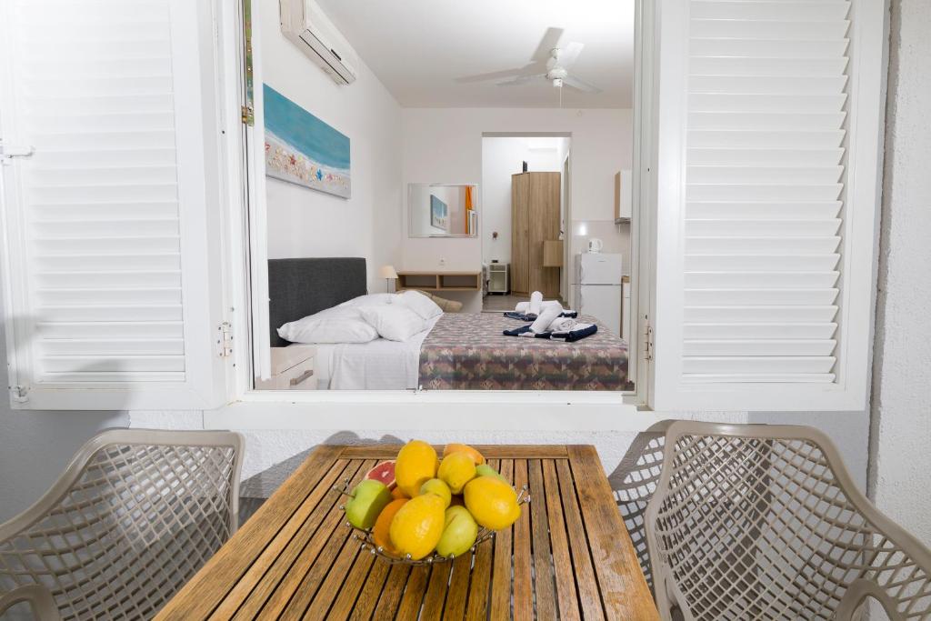 Postel nebo postele na pokoji v ubytování Stella Mare Eco Boutique House
