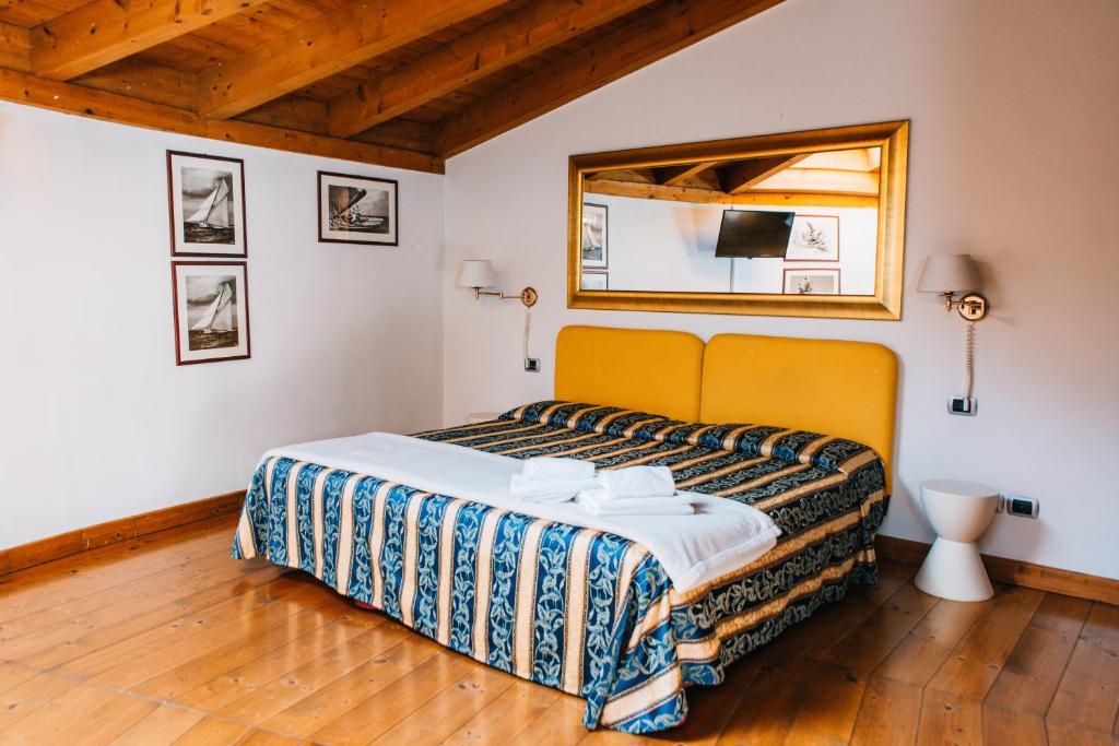 Postel nebo postele na pokoji v ubytování Arciduca Charming House Room & Breakfast
