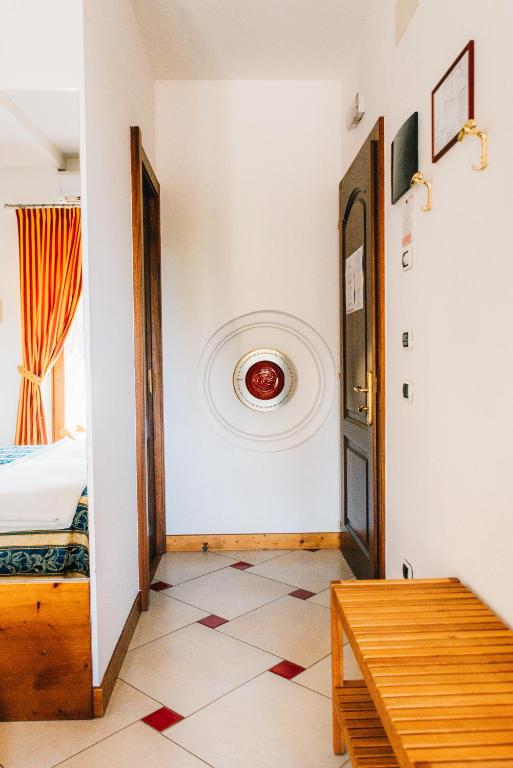 Postel nebo postele na pokoji v ubytování Arciduca Charming House Room & Breakfast