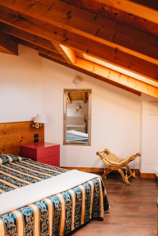 Postel nebo postele na pokoji v ubytování Arciduca Charming House Room & Breakfast
