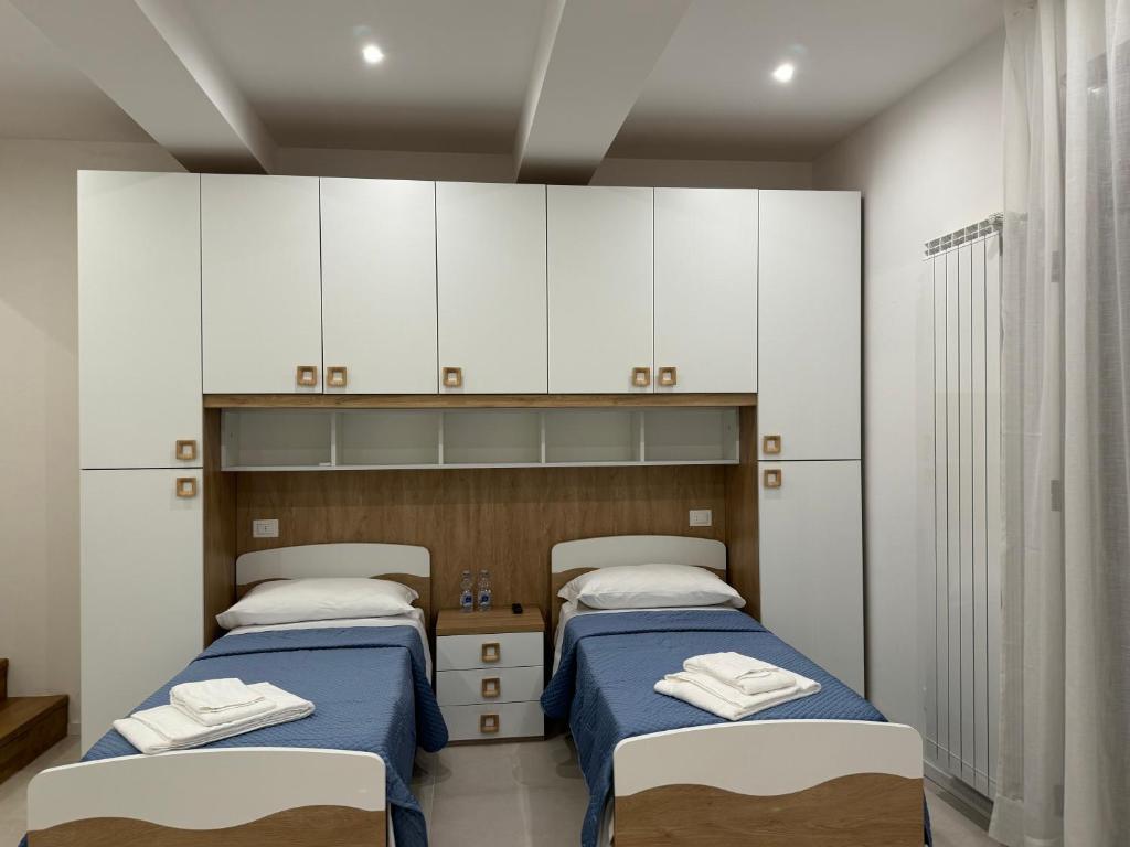 Postel nebo postele na pokoji v ubytování B&B La Coccinella