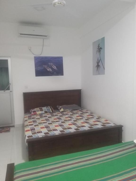 Postel nebo postele na pokoji v ubytování beach life hostal