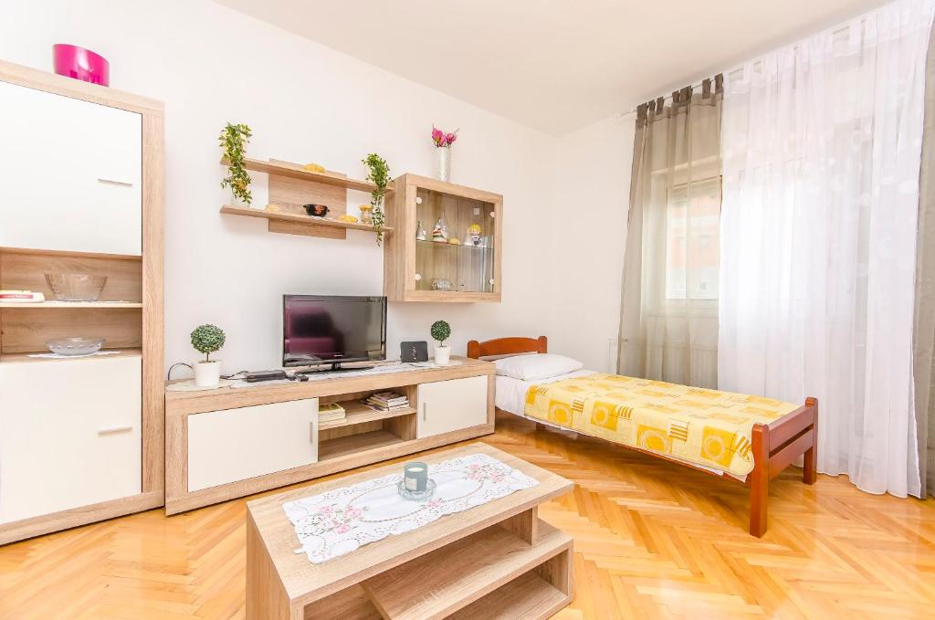 Kuchyň nebo kuchyňský kout v ubytování Apartment Sime