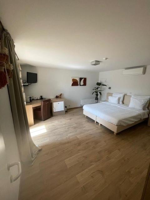 Letto o letti in una camera di Bouwelhoeve 't Schuur