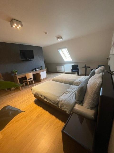 Letto o letti in una camera di Bouwelhoeve 't Schuur