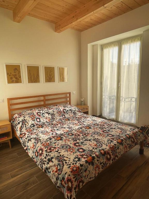 Postel nebo postele na pokoji v ubytování Dalla Chicchi