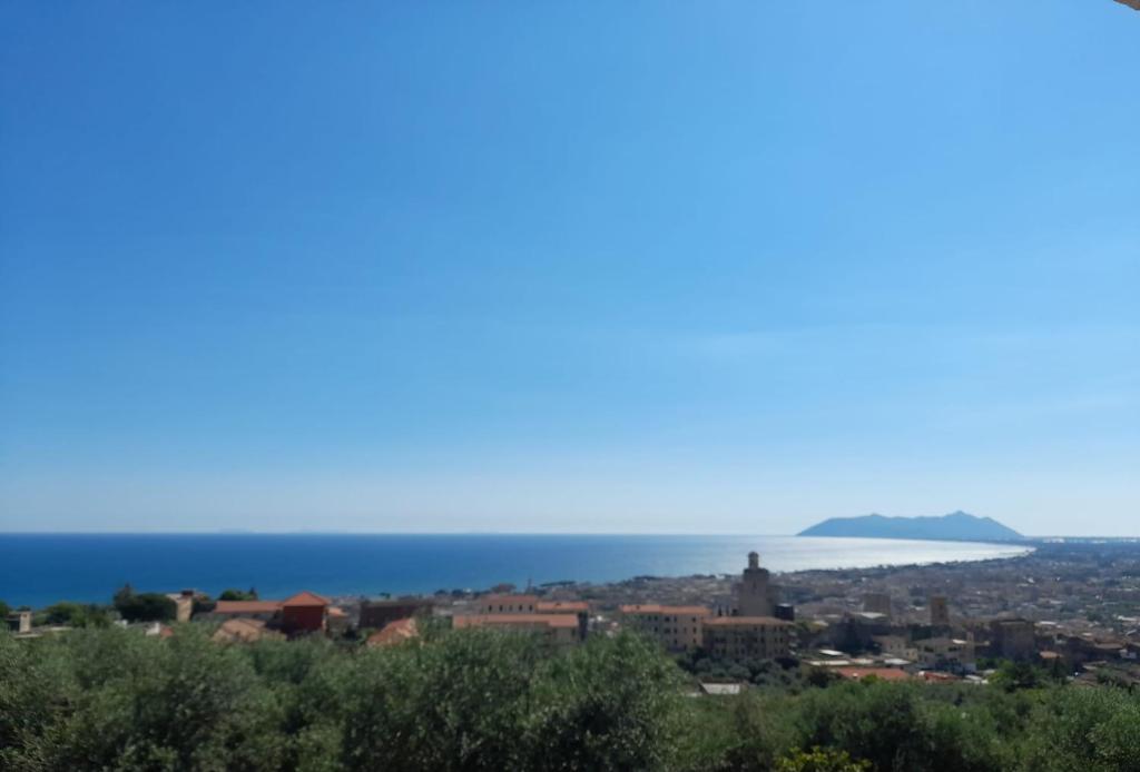 a view of the ocean from the top of a hill at B&B ANXUR in Terracina