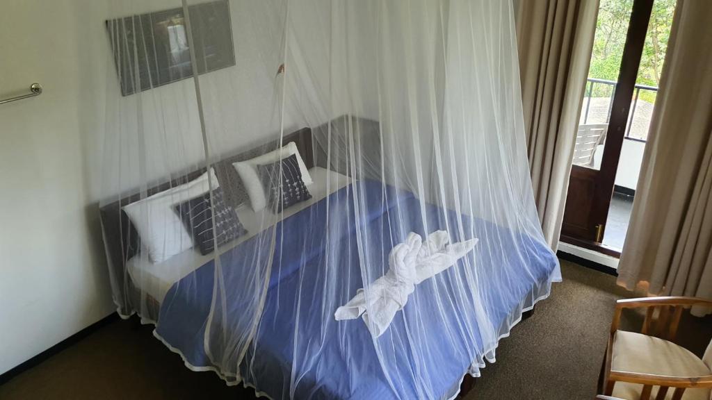 Postel nebo postele na pokoji v ubytování Villa Emerald Ella
