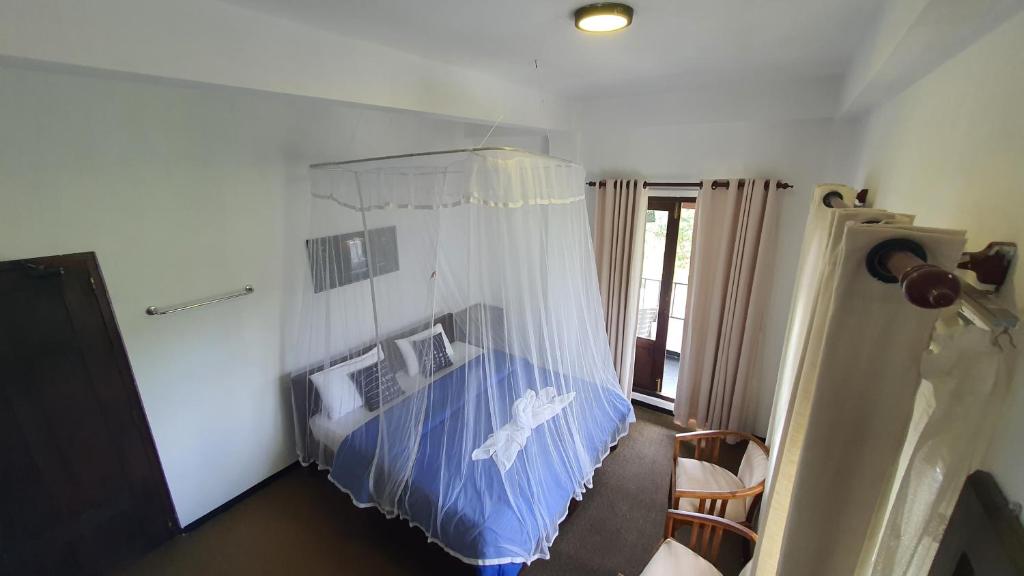 Postel nebo postele na pokoji v ubytování Villa Emerald Ella