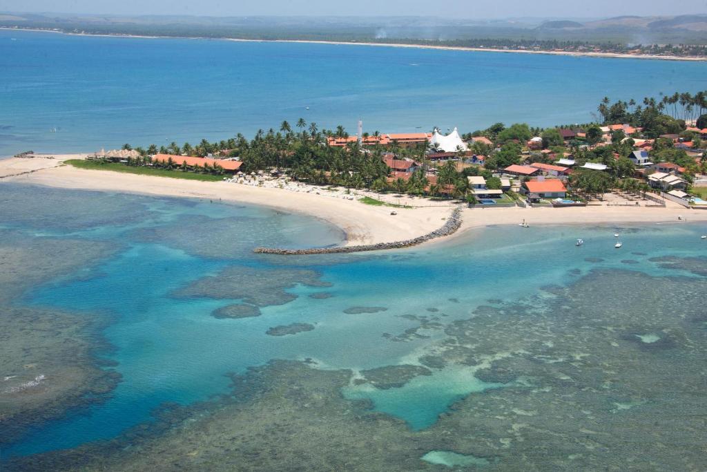 an aerial view of a beach in the ocean at Serrambi Resort in Porto De Galinhas