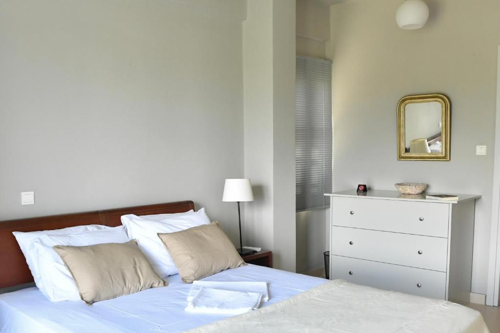 Posteľ alebo postele v izbe v ubytovaní Green 'n Gray Sea & Mountain House