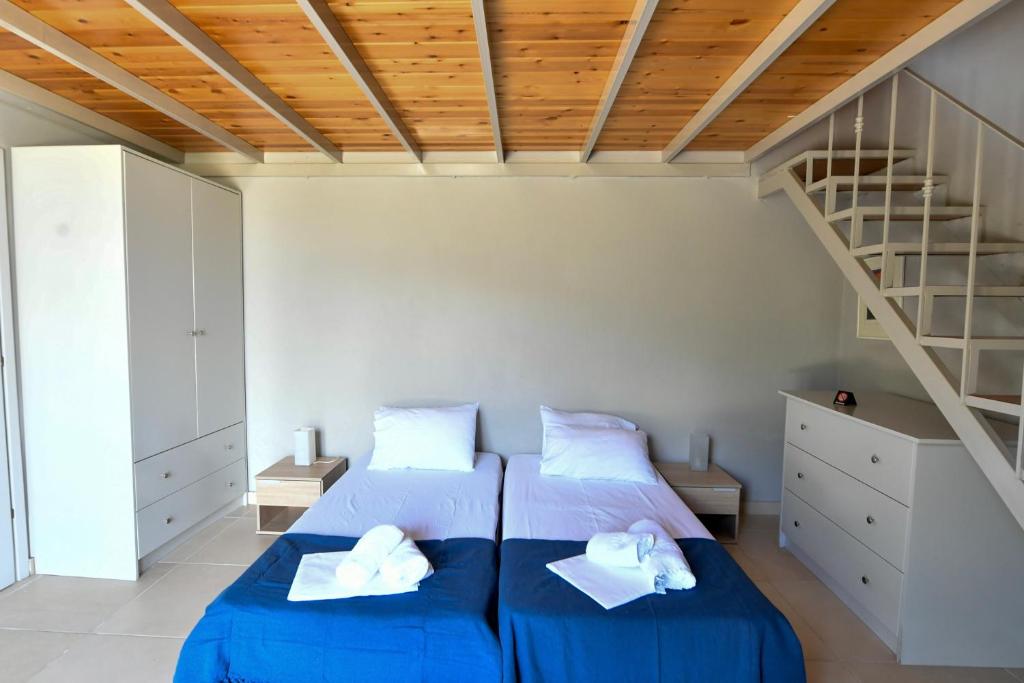 Posteľ alebo postele v izbe v ubytovaní Green 'n Gray Sea & Mountain House