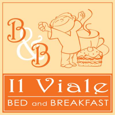 a sign for a day bed and breakfast with a cake at B&B Il Viale in Alba Adriatica