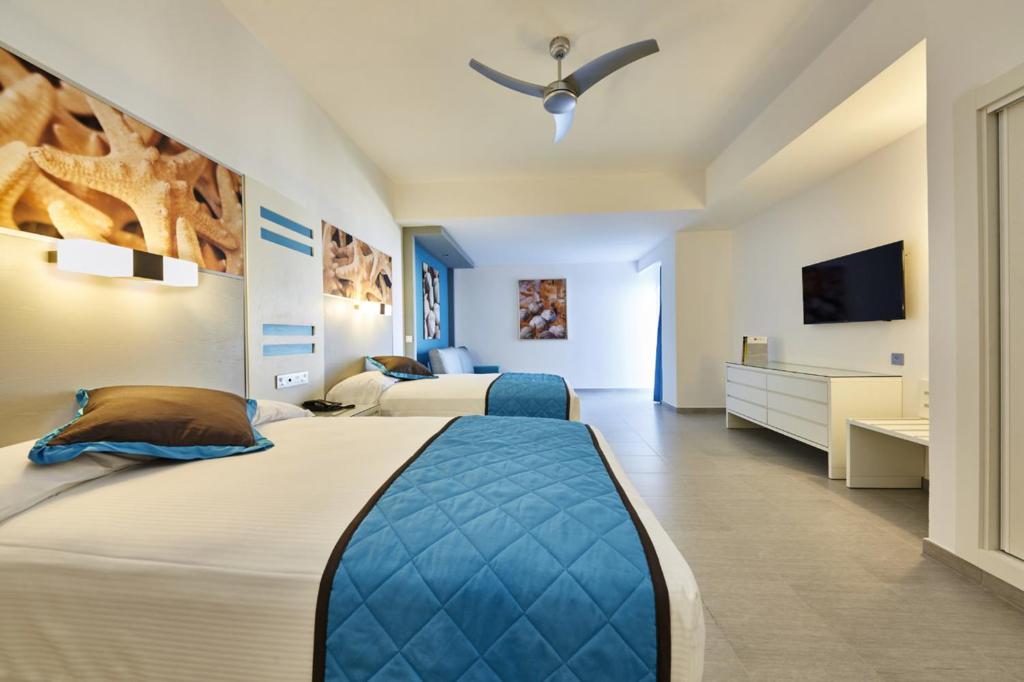 Cama o camas de una habitación en Riu Dunamar - All Inclusive
