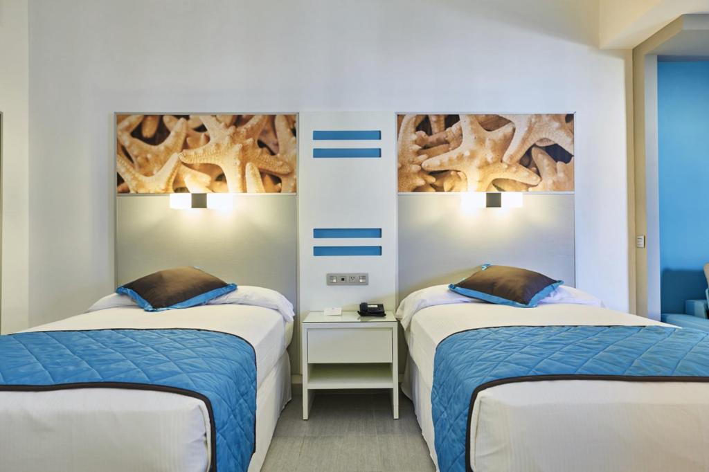 Cama o camas de una habitación en Riu Dunamar - All Inclusive