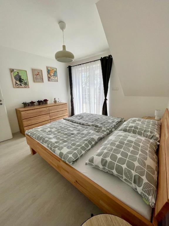 Postel nebo postele na pokoji v ubytování Apartmán Bystřice