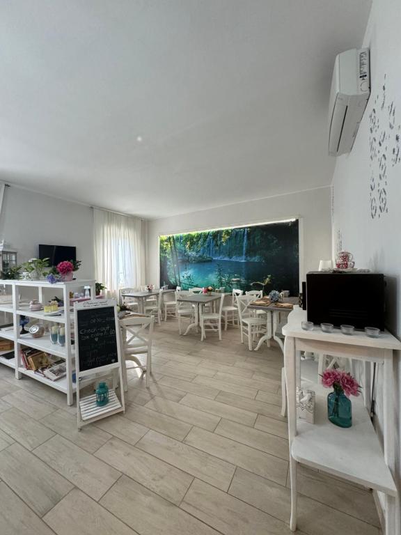 TV a/nebo společenská místnost v ubytování B&B La Terrazza