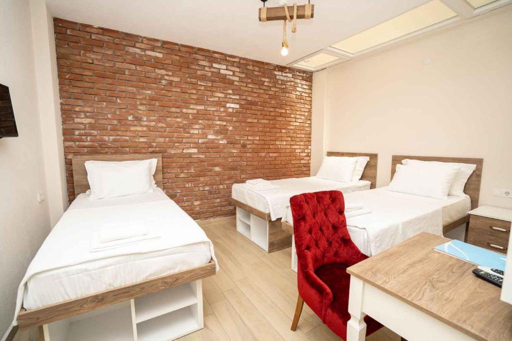 Postel nebo postele na pokoji v ubytování Harakop Otel