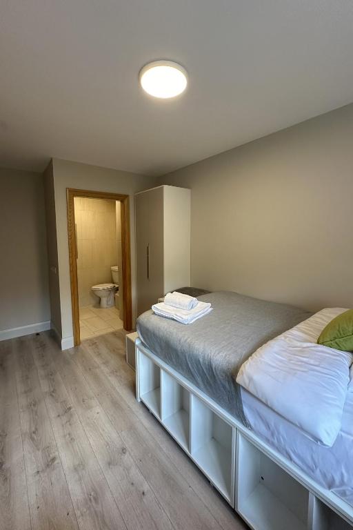 Postel nebo postele na pokoji v ubytování Cúirt na Coiribe Summer Accommodation