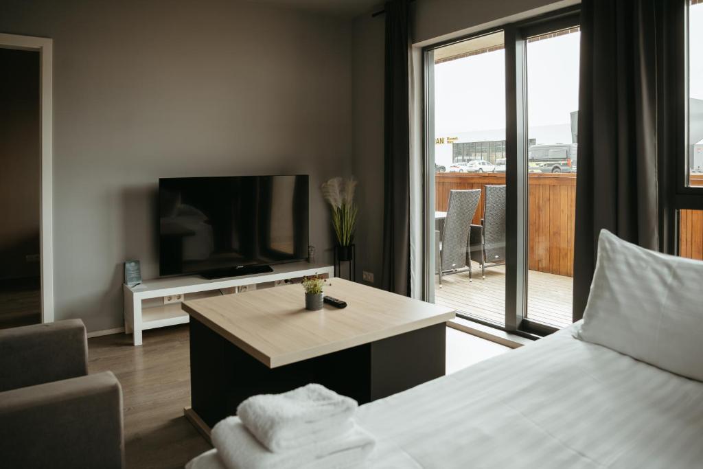 TV a/nebo společenská místnost v ubytování Vík Apartments