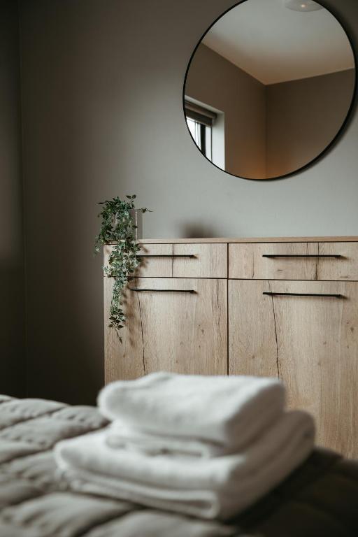 Postel nebo postele na pokoji v ubytování Vík Apartments