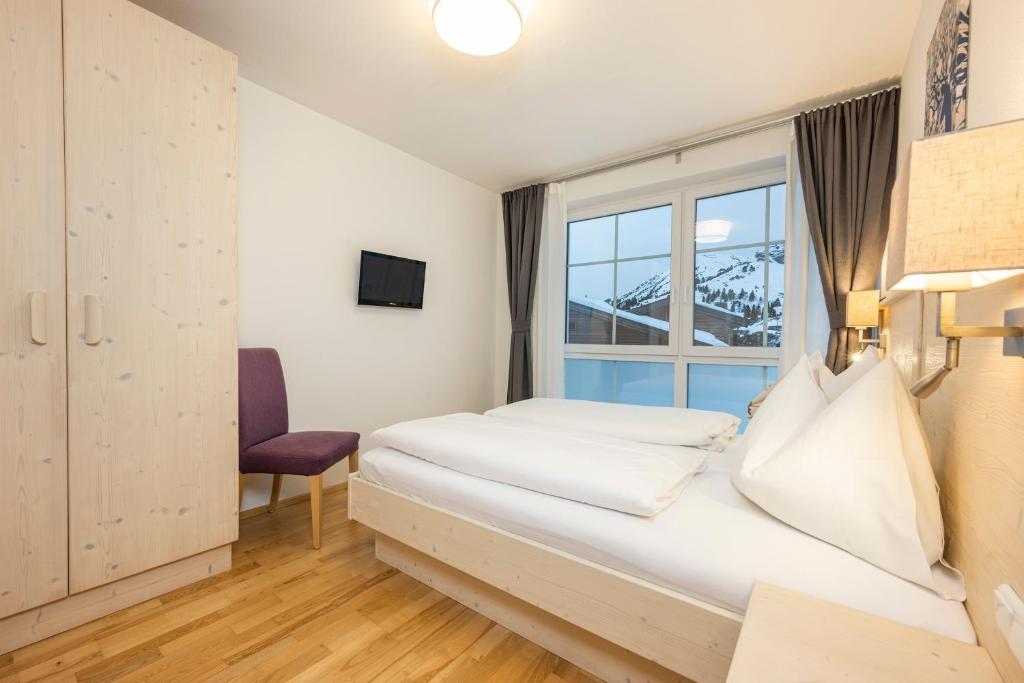 Postel nebo postele na pokoji v ubytování Appartement Haus Faßwald