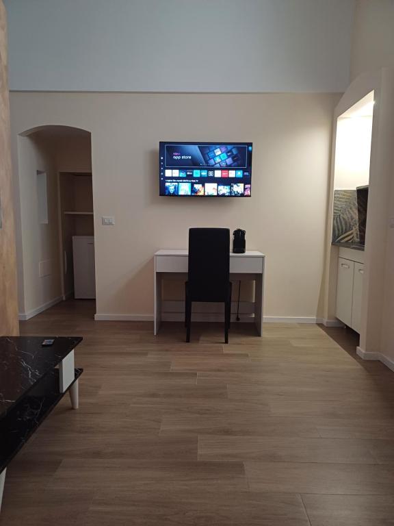 TV a/nebo společenská místnost v ubytování Suite 23